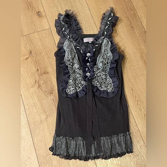 Black Sleeveless Top with Silver Embellishments